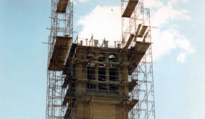 workers ready the top of the tower